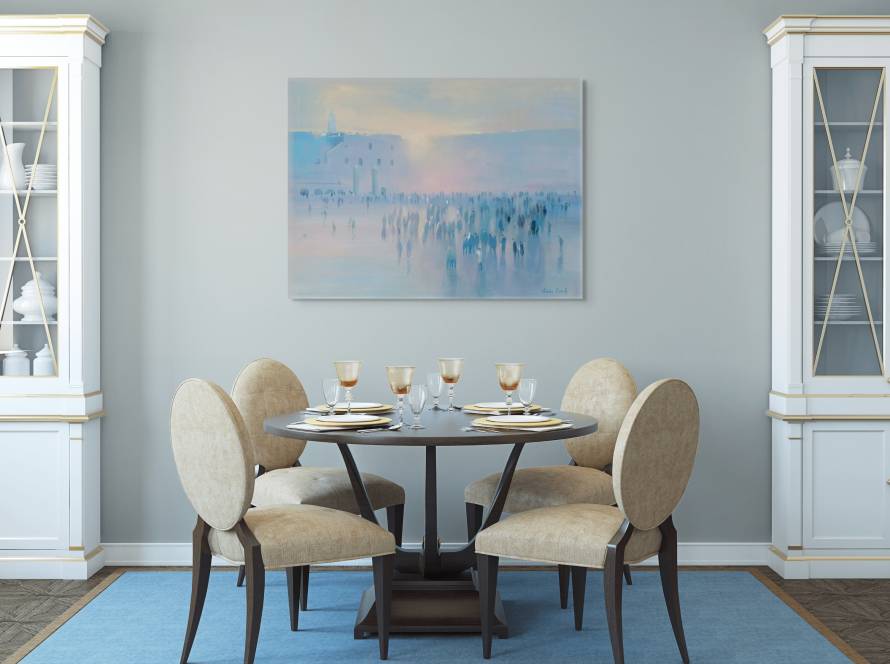 Mocup of "Sacred Morning Light Over Jerusalem" in a kitchen with two cabinets on the right and left side with kitchen table with plates and glasses setup in the middle